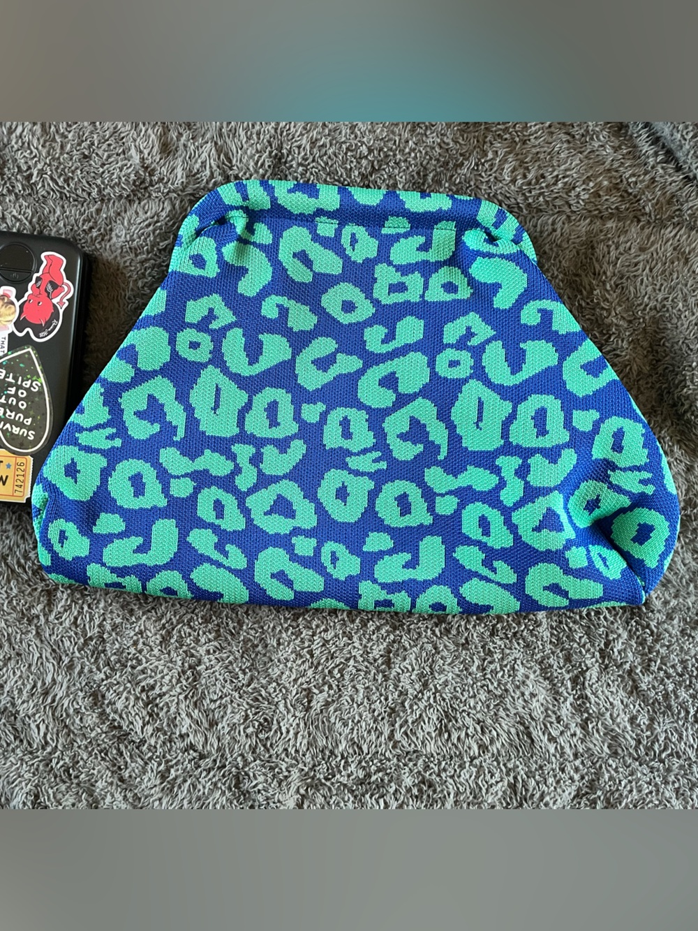 *LIKE NEW* LEOPARD PRINT CLUTCH (battery pack NOT INCLUDED)